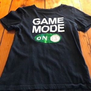 H&M black short sleeve t-shirt. Sequin on/off mode